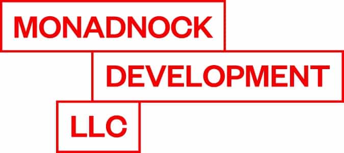 Monadnock Development and Signature